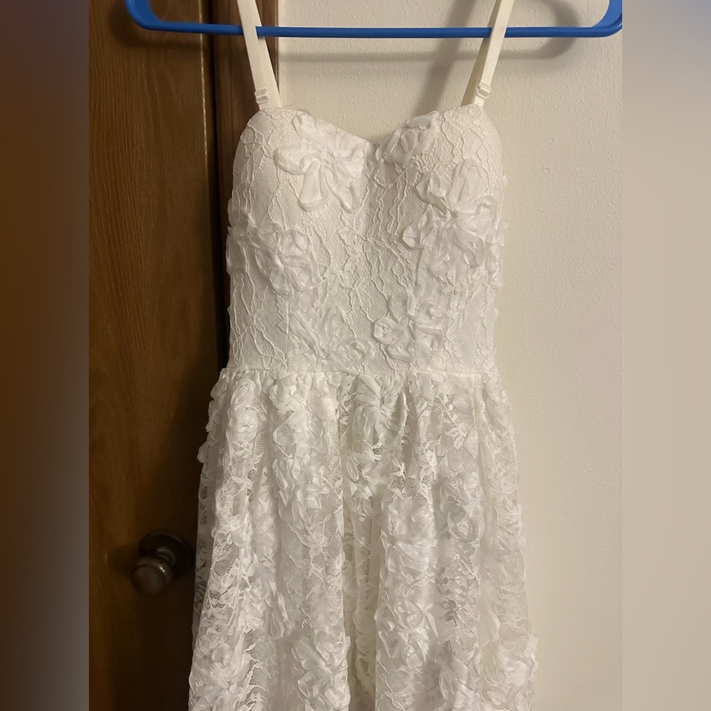 White flower flowy, shiny dress